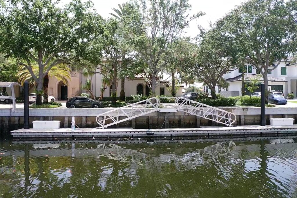 Exterior view of 230 N. Compass 6, showcasing modern architecture and surrounding landscaping.