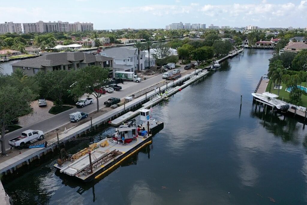 A scenic view of 230 N. Compass Barge, showcasing its unique architectural design against a clear sky.