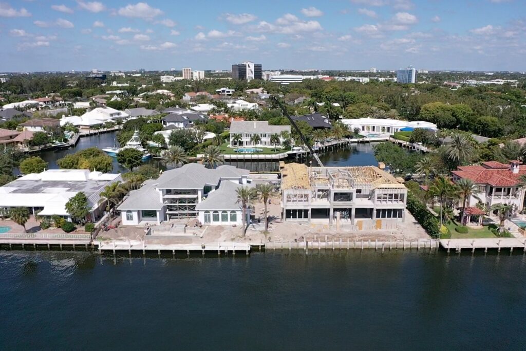 A view of the Compass Intercoastal Side 1, showcasing modern architecture and waterfront scenery.