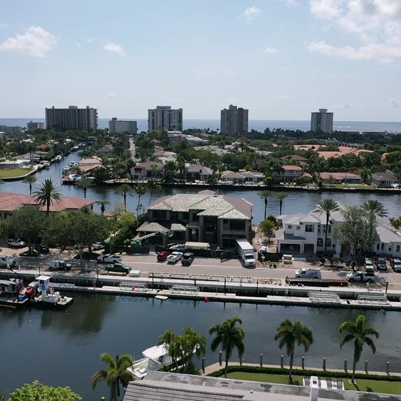 Exterior view of the 230 N. Compass Barge3, showcasing modern architecture and surrounding landscaping.