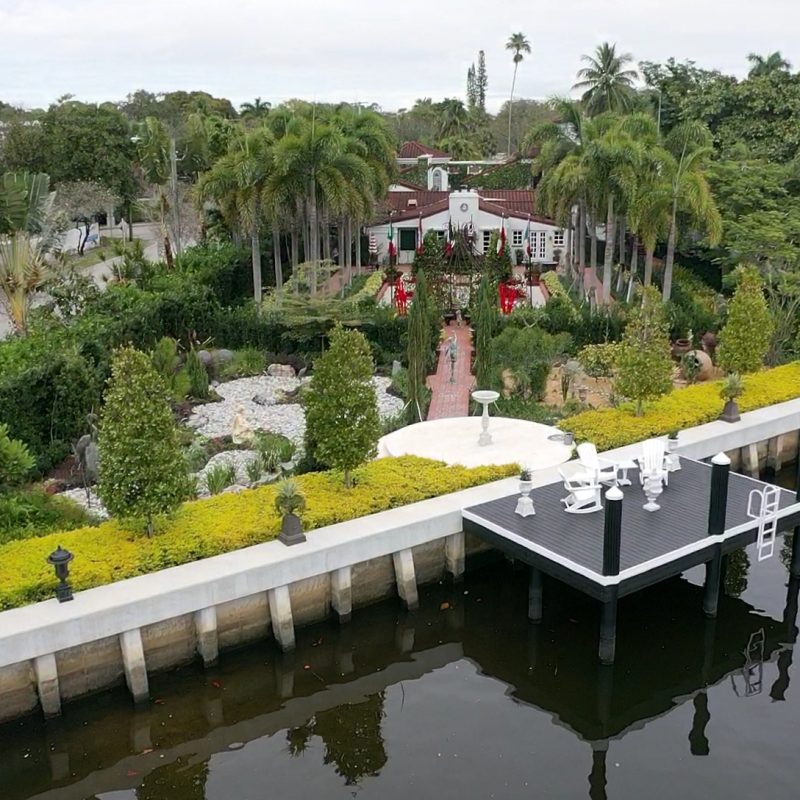 Exterior view of 416 Palm Ave8 showcasing a modern architectural design with lush landscaping.