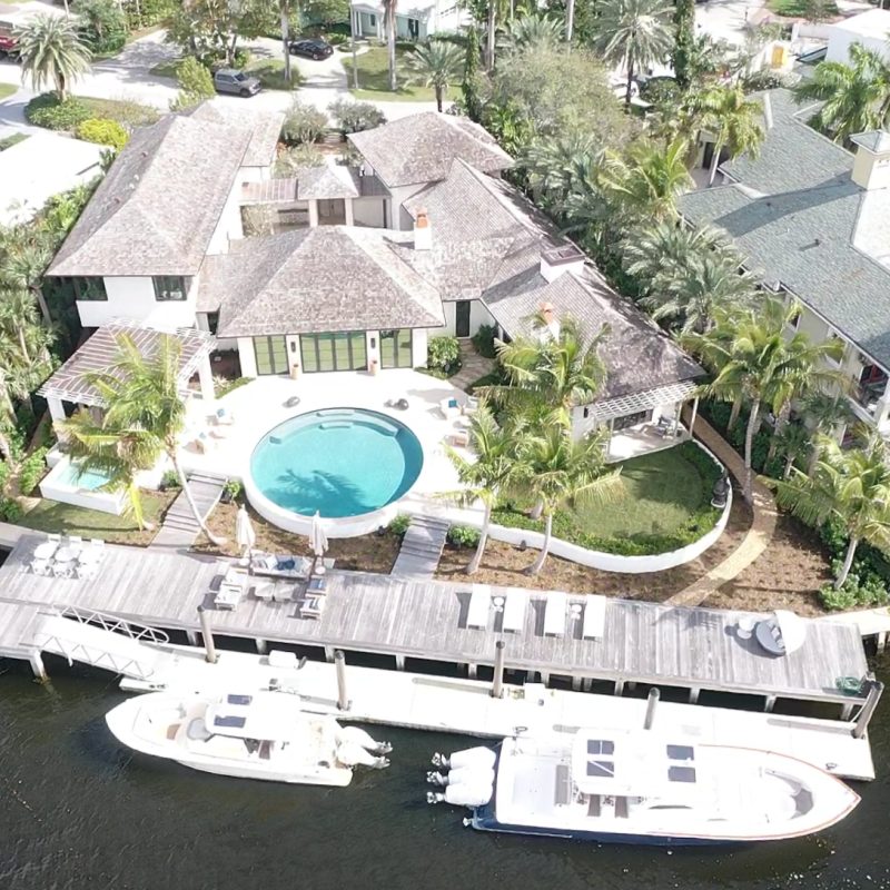 Exterior view of 509 Middle River 1, showcasing the modern architecture and surrounding landscape.