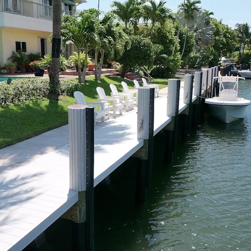Exterior view of 81 Isla Bahia 3, showcasing modern architecture and lush landscaping.