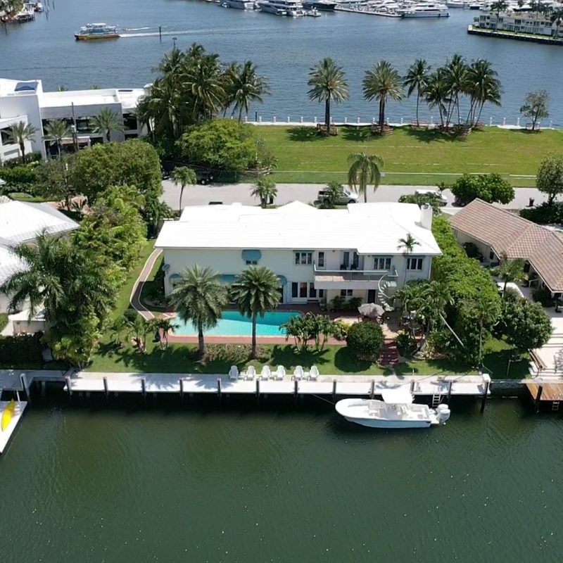 Modern waterfront property at 81 Isla Bahia 6, showcasing luxury design and scenic views.